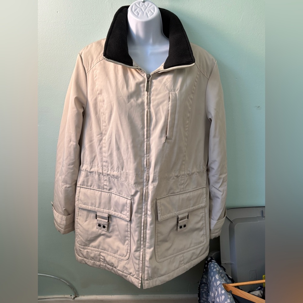 The London Fog women's trench coat in beige with a corduroy brown collar is a cl